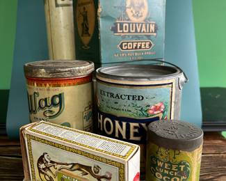 Antique advertising tins and cardboard containers: G&P bread, McLaughlin Coffee, Quaker, CR Tartar, Wag Coffee, Schepp’s Cocoanut, A&P Coffee, Eslinger honey, Louvain Coffee, Gold Bond A1 Coffee, Thomas J Webb Coffee, CW Coffee, SE Johnson powdered dancing wax, Tropic Aroma Coffee, Maxwell House Coffee, Forbes Quality Coffee, Great American pepper, Rich’s Canton Ginger, Ferndall Coffee, Bravo Coffee, Mrs. Stewart’s liquid bluing, Ideal Not-A-Seed Raisins, Cracker Jack, Calumet Baking Powder, Golden Rule Cocoa, Watkins Baking Powder, Back Diamond Cod, Bermont Whiskey, Brach’s Supreme Marshmallows, Planters Pennant Peanuts, Bunny Rolled Oats, A&P cloves spice tins, Heinz, Ivin’s biscuits, Crisp