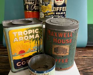 Antique advertising tins and cardboard containers: G&P bread, McLaughlin Coffee, Quaker, CR Tartar, Wag Coffee, Schepp’s Cocoanut, A&P Coffee, Eslinger honey, Louvain Coffee, Gold Bond A1 Coffee, Thomas J Webb Coffee, CW Coffee, SE Johnson powdered dancing wax, Tropic Aroma Coffee, Maxwell House Coffee, Forbes Quality Coffee, Great American pepper, Rich’s Canton Ginger, Ferndall Coffee, Bravo Coffee, Mrs. Stewart’s liquid bluing, Ideal Not-A-Seed Raisins, Cracker Jack, Calumet Baking Powder, Golden Rule Cocoa, Watkins Baking Powder, Back Diamond Cod, Bermont Whiskey, Brach’s Supreme Marshmallows, Planters Pennant Peanuts, Bunny Rolled Oats, A&P cloves spice tins, Heinz, Ivin’s biscuits, Crisp