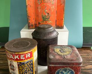 Antique advertising tins and cardboard containers: G&P bread, McLaughlin Coffee, Quaker, CR Tartar, Wag Coffee, Schepp’s Cocoanut, A&P Coffee, Eslinger honey, Louvain Coffee, Gold Bond A1 Coffee, Thomas J Webb Coffee, CW Coffee, SE Johnson powdered dancing wax, Tropic Aroma Coffee, Maxwell House Coffee, Forbes Quality Coffee, Great American pepper, Rich’s Canton Ginger, Ferndall Coffee, Bravo Coffee, Mrs. Stewart’s liquid bluing, Ideal Not-A-Seed Raisins, Cracker Jack, Calumet Baking Powder, Golden Rule Cocoa, Watkins Baking Powder, Back Diamond Cod, Bermont Whiskey, Brach’s Supreme Marshmallows, Planters Pennant Peanuts, Bunny Rolled Oats, A&P cloves spice tins, Heinz, Ivin’s biscuits, Crisp