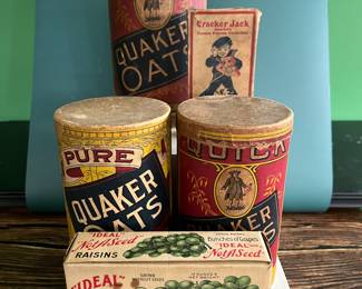 Antique advertising tins and cardboard containers: G&P bread, McLaughlin Coffee, Quaker, CR Tartar, Wag Coffee, Schepp’s Cocoanut, A&P Coffee, Eslinger honey, Louvain Coffee, Gold Bond A1 Coffee, Thomas J Webb Coffee, CW Coffee, SE Johnson powdered dancing wax, Tropic Aroma Coffee, Maxwell House Coffee, Forbes Quality Coffee, Great American pepper, Rich’s Canton Ginger, Ferndall Coffee, Bravo Coffee, Mrs. Stewart’s liquid bluing, Ideal Not-A-Seed Raisins, Cracker Jack, Calumet Baking Powder, Golden Rule Cocoa, Watkins Baking Powder, Back Diamond Cod, Bermont Whiskey, Brach’s Supreme Marshmallows, Planters Pennant Peanuts, Bunny Rolled Oats, A&P cloves spice tins, Heinz, Ivin’s biscuits, Crisp