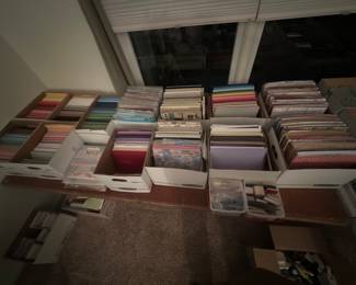 Thousands of sheets of craft, card and scrapbook paper - some unopened