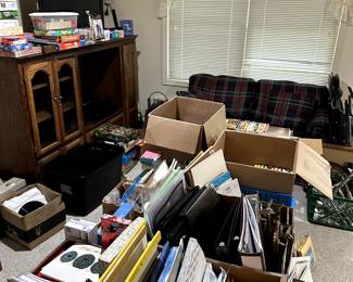 Entertainment Center, Couch, Records, TV.... so much accumulation