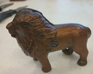 Cast iron lion bank.