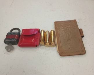 Antique makeup and padlock with key.