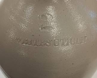Utica stoneware jug