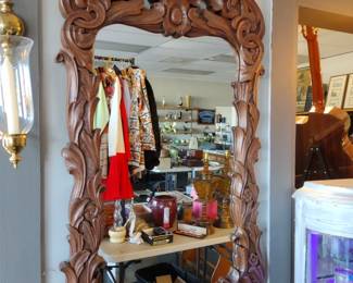Large hand carved mirror.