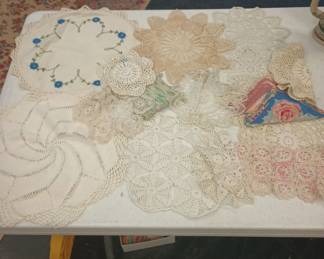 Vintage hand sewn doilies.