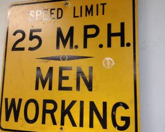 Vintage speed limit 25 mph men working sign.