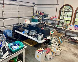 Lots of misc items in the garage includingTools Electronic equipment  cleaning items.  Dog leashes, collars, grooming tools