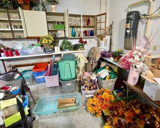 Miscellaneous floral and craft items.  New wreaths, arrangements, silk flowers.  Yankee Candles, vases, glass bottles 