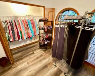 Men's dress shirts and pants. Some jeans.  Silk ties new and like new.  Jerry Garcia, top brands.