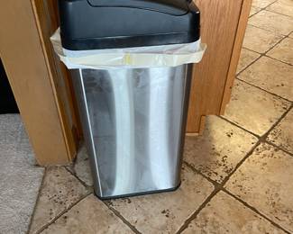 . . . stainless steel waste can