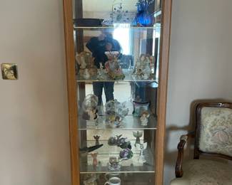 . . . beautiful curio cabinet stuffed with treasures