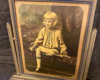 Antique hand-colored photo in antique wood frame