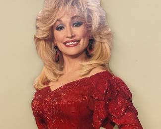 Half-body cardboard cutout of Dolly in red
