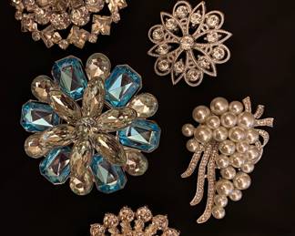 Variety of new & vintage rhinestone brooches.