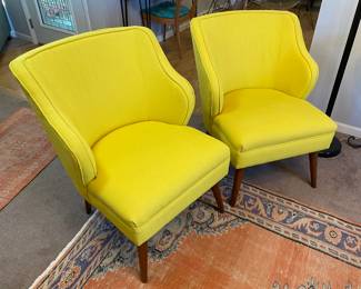 Two canary yellow mid-century chairs. Sold separately.