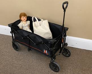 Collapsible market cart with vintage doll, sold separately 