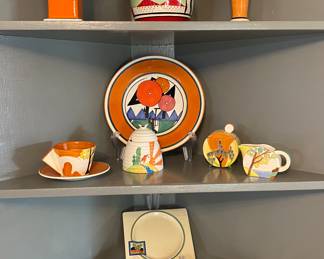 Variety of mid-century ceramic dishes including Clarice Cliff.