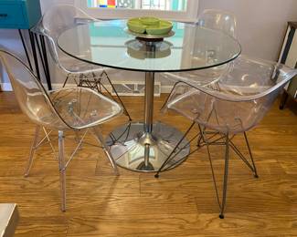 Round glass top table w/chrome base & 2 sets of matching clear acrylic chairs, one with armrests, one without