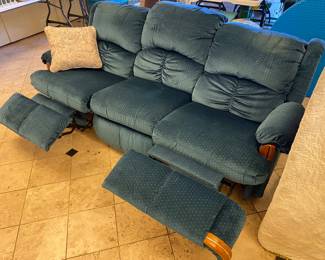 Two identical blue couches with double recliners, sold separately 