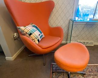 Replica mid-century orange atomic chair with matching ottoman 