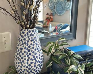 blue mirror and home decor items