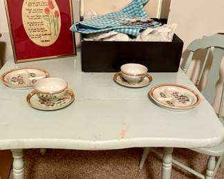 Children's table and chair, children's porcelain tea set.