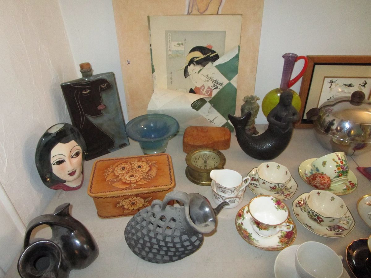Table of treasures, SW pottery, teacup collection, art and more