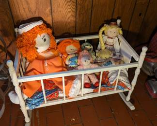 Vintage Children's Rocking Crib with Stuff Animals. 