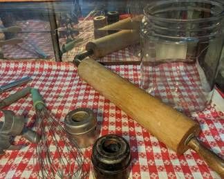 Display Case with Antique Baking and Kitchen Equipment. 
