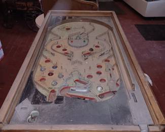 Vintage Pinball Machine. We do have the legs and glass.