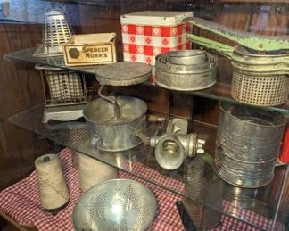 Display Case with Antique Baking and Kitchen Equipment. 