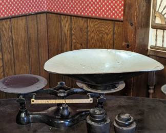 Antique Cast Iron Balance Scale with Counter Weights.