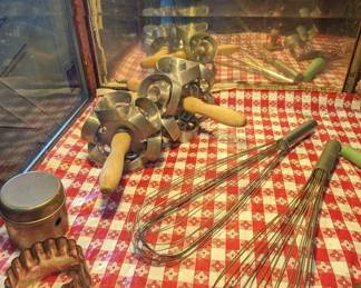 Display Case with Antique Baking and Kitchen Equipment. 