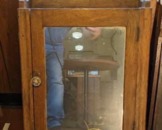 This is a very old medicine cabinet