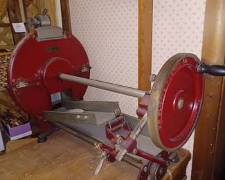 The oldest bread slicing machine. Henry Ford Village asked for this piece to be donated. The owner would like to sell it. This is a museum quality piece!