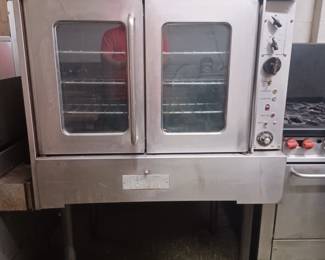 Nice commercial convection oven. Currently hooked up and available to test out. The measurements are 58" wide x 45" deep x 63" high.