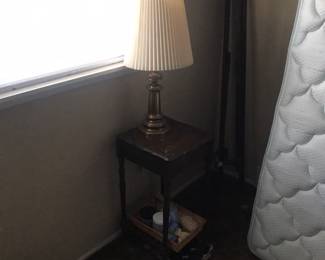 Another cute nightstand and brass lamp!