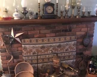 Both the mantle and the hearth displayed with antiques! Lovely mantle clock by Marvel!