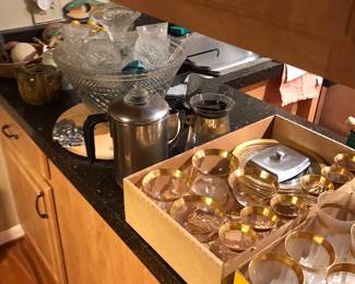 Gold rimmed glassware also has matching dishware