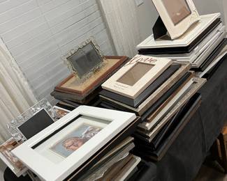 Dozens of picture frames 