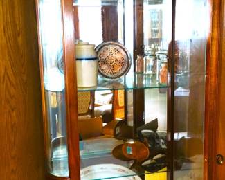 Tall, narrow curio cabinet
