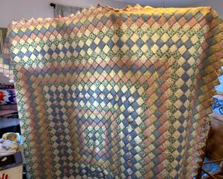 #107	factory made quilt square blue/pink  80x88	 $25.00 			
