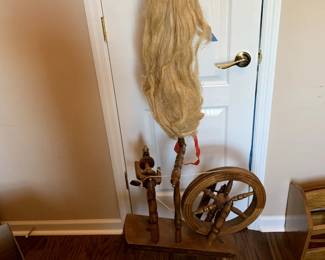 #37	small spinning wheel with hair  22x8x27	 $150.00 			
