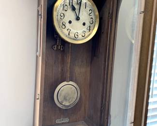#52	wall clock as is wood with key 13x7x31	 $75.00 			
