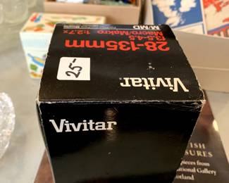 #154	camera	Vivitar 28-135 mm lens	 $25.00 			
