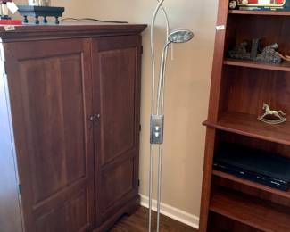 #34	chrome floor lamp with 2 lights 71 tall 	 $75.00 			
