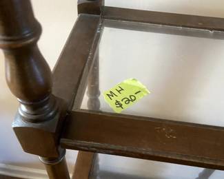 #162	mh	glass top shelf with 4 shelves and 1 drawer	 $20.00 			
