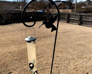 #64	metal post with humming bird design	 $25.00 			
